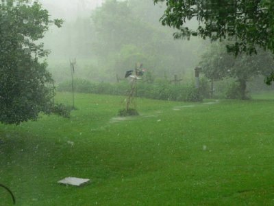 'river' flowing past our garden
during tremendous rain and hail 