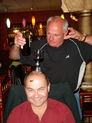 Dave (pouring the wine) and Larry