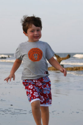 Davikd running on the beach