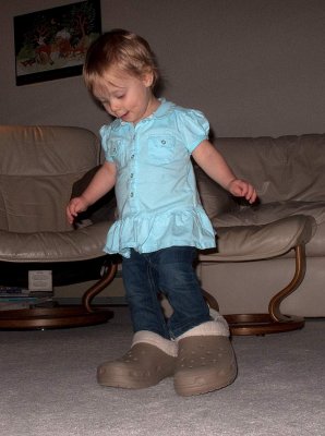 Lydia trying to walk in Grandpa's shoes