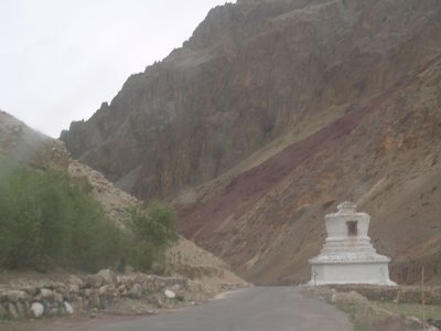 Entering Ladakh proper, with its characteristic Tibetan stupas (chorten) and magenta-and-green mountain strata