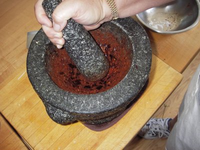 Grinding chilli paste