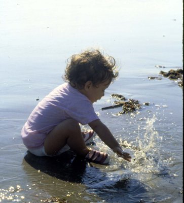 splashing in the surf