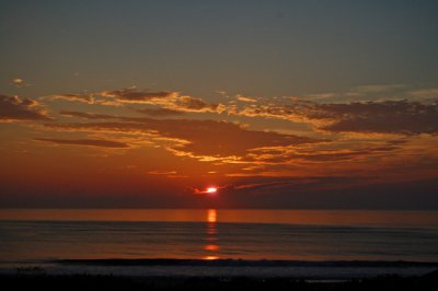 Florida Sunrise over calm ocean waters.