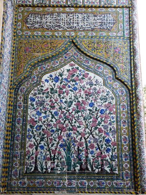 tiling, with its predominantly floral motifs, was added in the early Qajar era