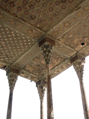 attractive wooden ceiling with intricate inlay work and exposed beams, reminiscent of the Chehel Sotun Palace