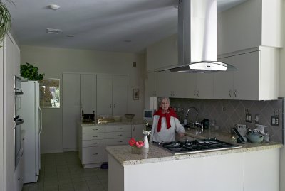 Mom in her new kitchen 02