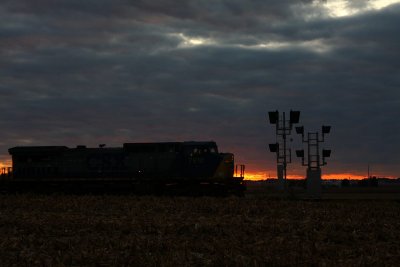 Q514 rolls north through the 268.4 signal at dusk.