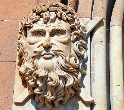 Head on a church entrance