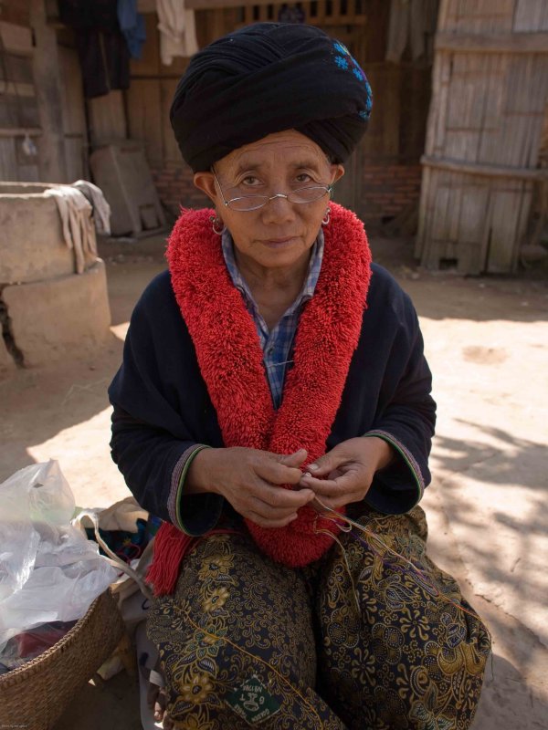 Yao woman making handicraft