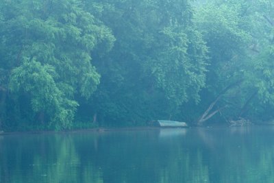 Abandoned Rowboat on a Foggy Morning
