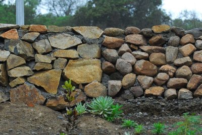 Stone wall, typical style at condo