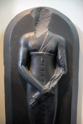 Basalt sarcophagus lid with a male figure, Late Dynastic Period ca 340 BC