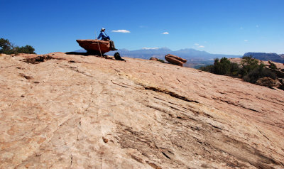 Resting on a boulder