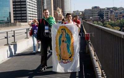 Young man with Virgin Mary flag