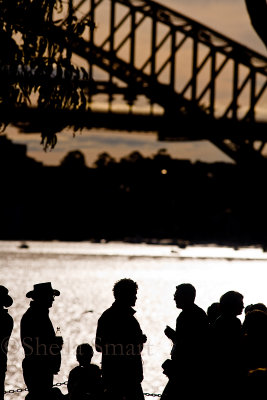 Silhouettes of those waiting to see Pope on Sydney Harbour