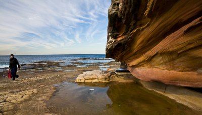 Sandstone at Dee Why with fisherman