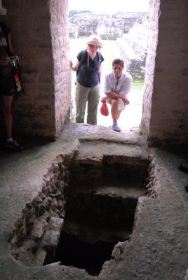Angela and Nina observe a Mayan tomb.