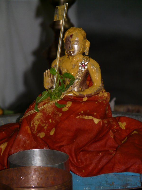 Ponnadikal Jeeyar undergoing Thirumanjanam.jpg