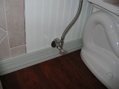 Fancy trim work around shutoff valve.  Still have some grout cleanup to do.