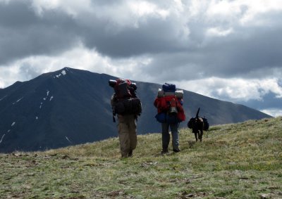 Two Colorado Hikers and their hiking dog