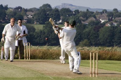 Barwick batter tries to blat one over Almscliffe Crag