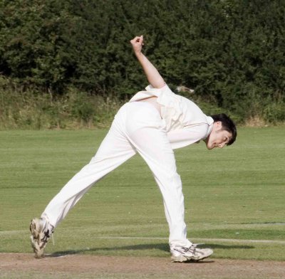Ollie tries his surprise over-the-head back-flick delivery