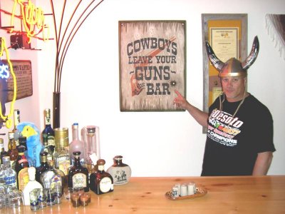cowboys leave your guns bar.jpg