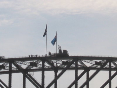 If you look close you can see the bridge climbers just to the left of the flag pole