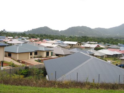 This is new housing constructions in Cairns. Notice the solid sheet metal roofs. No shingles used here