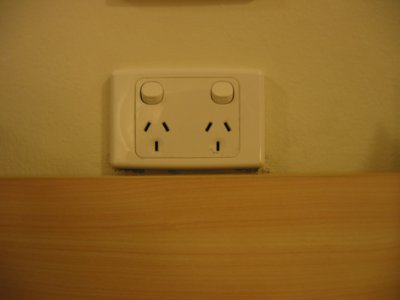 Heres what an electrical outlet looks like in Australia. Australia runs on 220 volts at 50 Hz so adapters are required