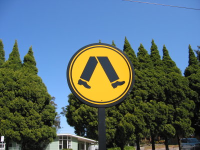 I thought this was pretty funny for a pedestrian walkway it shows a dude with platform shoes