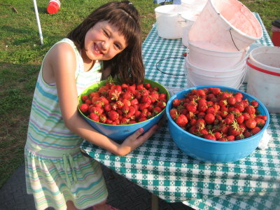 Sarah with her bowls of strawberries