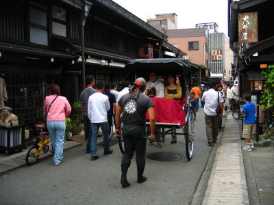 Tourists in a Sanmachi rickshaw