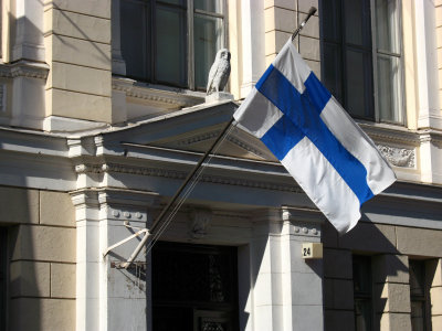 Finnish flag hanging off a neo-classical building