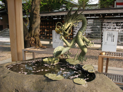 Temizuya at the temple with dragon ornamentation