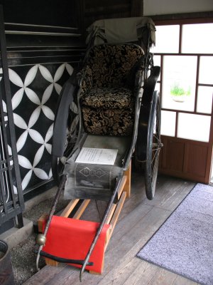 Old rickshaw in a restaurant foyer