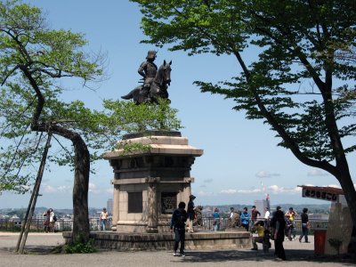 Masamune statue and neighboring greenery