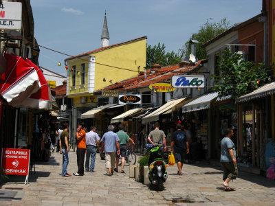 Čaršija bazaar scene with minaret
