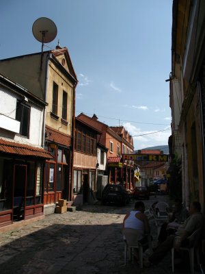 Old men relaxing in the shade on a Čarija street