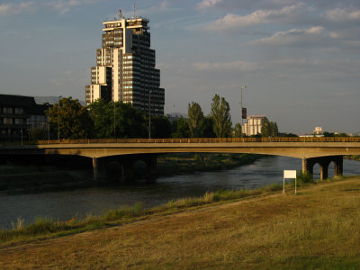 Modern bridge over the Vardar with tower block