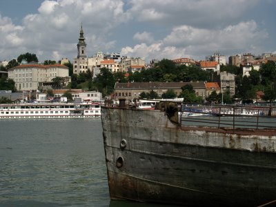 Rusty old ship and Belgrade skyline