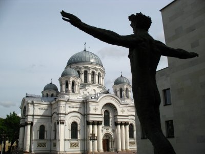 'Man' statue and St. Michael the Archangel's Church