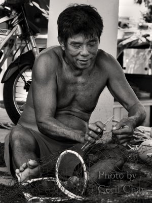 Mending Fishing Net.jpg