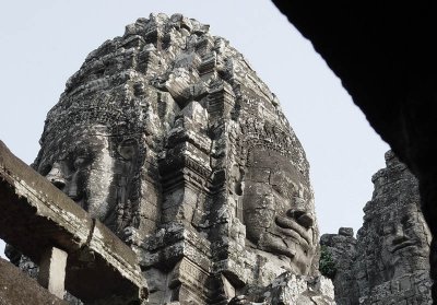 Towards the end of the 12th century, the Buddhist king Jayavarman VII, in order to assure perpetuity to the symbolic cult of the Devaraja, instituted the similar cult of the Buddha-king at the Bayon - the central temple of Angkor Thom - manifest in the portrait statue that was found broken at the bottom of the well (and which has now been restored). This form of adaptation, however, was not to last, and from the 13th century, following a return to Shivasm, the Buddhism of the Large Vehicle - of the Sanskrit language - was replaced by that of the Small Vehicle - of the Pali language - to which Cambodia has remained faithful.