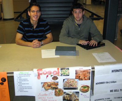 Yoann Buch (L) and another student selling ISU International Night tickets IMG_0558.jpg