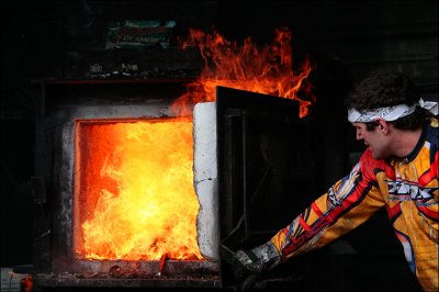 Tending the fiery furnace.