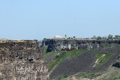 Perrine Bridge, base jumpers, nearby scenery.