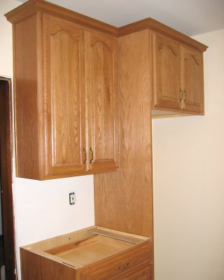 Fridge area with crown molding