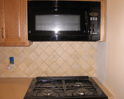 Deco tiles above stove